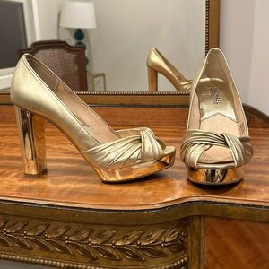 Metallic gold peeptoe heels